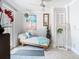 Bright sunroom with tiled floors, lounge seating, and charming coastal-inspired decor at 5852 Medinah Way, Orlando, FL 32819
