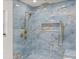 Luxurious bathroom with rain shower, body jets, and built-in niche for toiletries at 625 N Central Ave, Oviedo, FL 32765