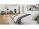Modern bedroom with hardwood floors, neutral decor, and plenty of natural light at 625 N Central Ave, Oviedo, FL 32765