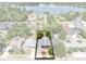 Aerial view of property highlighting location within neighborhood and nearby lake at 657 Overspin Dr, Winter Park, FL 32789