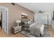 Spacious main bedroom featuring a comfortable bed, stylish decor, and ample closet space at 657 Overspin Dr, Winter Park, FL 32789