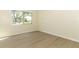 Bright bedroom with large window offering natural light and a pleasant view at 662 Kenwick Cir # 102, Casselberry, FL 32707