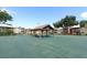 Community gazebo with picnic tables, offering a relaxing outdoor space for gatherings and activities at 662 Kenwick Cir # 102, Casselberry, FL 32707