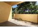Outdoor patio featuring textured walls and gravel at 662 Kenwick Cir # 102, Casselberry, FL 32707
