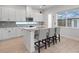Bright, modern kitchen featuring stainless steel appliances, granite countertops, and a spacious center island at 6875 Bridgman St, Orlando, FL 32827
