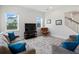 Cozy living room with modern furnishings, neutral walls, and bright windows for natural light at 6875 Bridgman St, Orlando, FL 32827