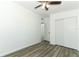 Bedroom with modern flooring, ceiling fan, and closet storage at 707 N Solandra Dr, Orlando, FL 32807