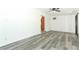 Clean living room with a ceiling fan and sliding door to a back patio at 707 N Solandra Dr, Orlando, FL 32807