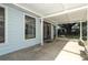 Covered patio space with sliding doors, perfect for outdoor living at 707 N Solandra Dr, Orlando, FL 32807