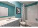 Well-lit bathroom with a clean, modern design, showcasing a bathtub-shower combination and stylish fixtures at 746 Mocking Jay Ln, St Cloud, FL 34771