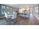 A view of the dining and kitchen area including stainless appliances, and a dining table set for 6 at 746 Mocking Jay Ln, St Cloud, FL 34771