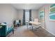 Inviting home office with modern decor, comfortable seating, and a sleek desk setup for productivity at 746 Mocking Jay Ln, St Cloud, FL 34771