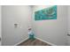 The practical laundry room, complete with essential connections and space-saving design for effortless chores at 746 Mocking Jay Ln, St Cloud, FL 34771