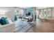 Inviting living room with comfortable seating and a large window offering natural light at 746 Mocking Jay Ln, St Cloud, FL 34771