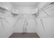 Spacious walk-in closet with ample shelving and hanging space for organized storage at 746 Mocking Jay Ln, St Cloud, FL 34771