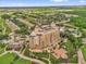 Stunning high-rise condo offering a resort-style setting with golf course, lush greenery, and community amenities at 7593 Gathering Dr # 502, Reunion, FL 34747