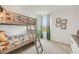 Bedroom featuring wooden bunk beds, neutral carpet and a window for natural light at 776 Mocking Jay Ln, St Cloud, FL 34771