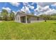 Home exterior and spacious grassy backyard at 8202 Sw 123Rd Ter, Dunnellon, FL 34432