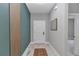 Entryway with decorative wall paneling, clean lines, and modern flooring at 8202 Sw 123Rd Ter, Dunnellon, FL 34432