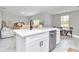 Bright kitchen with an island, stainless steel dishwasher, and open layout at 8202 Sw 123Rd Ter, Dunnellon, FL 34432