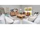 Comfortable living room showcasing stylish decor, gray couches, and a wooden coffee table at 8202 Sw 123Rd Ter, Dunnellon, FL 34432
