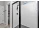 Modern shower featuring subway tile and black trim at 8202 Sw 123Rd Ter, Dunnellon, FL 34432