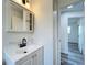 Bathroom featuring updated vanity and modern fixtures at 1000 E Dixie Ave, Leesburg, FL 34748