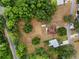 Aerial view showcases the property's expansive lot and surrounding lush landscape at 10059 Sali Dr, Orlando, FL 32817