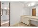 Bathroom with a vanity area and a separate room for the toilet and shower at 10059 Sali Dr, Orlando, FL 32817