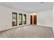 Bright living room with plush carpet and large windows for natural light at 10059 Sali Dr, Orlando, FL 32817