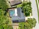 Overhead view of the house featuring a backyard pool and patio area at 1014 Seminole Creek Dr, Oviedo, FL 32765