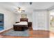 Comfortable bedroom features hardwood floors, natural light, and closet access at 1014 Seminole Creek Dr, Oviedo, FL 32765