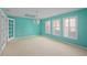 Bright bedroom with natural light streaming through the large window, creating a relaxing atmosphere at 102 Old Hickory, Longwood, FL 32750