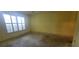 Bedroom with a large window, allowing plenty of natural light at 102 Old Hickory, Longwood, FL 32750