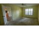 Bedroom with natural light and fan ready for renovations at 102 Old Hickory, Longwood, FL 32750