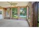 Enclosed patio with brick accents and a view of the backyard pool at 102 Old Hickory, Longwood, FL 32750
