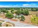 Aerial view highlights a sprawling home with a pool and mature trees, set within a large property at 106 8Th St, Lake Hamilton, FL 33851