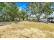 Large backyard with shed, trees, and room for gardening at 106 8Th St, Lake Hamilton, FL 33851
