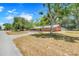 Single Gathering home with a lush lawn and mature trees in a peaceful, shaded setting at 106 8Th St, Lake Hamilton, FL 33851