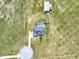 Aerial view of home featuring pool, fenced yard, long driveway and large lot at 11115 Romance Ct, Winter Garden, FL 34787