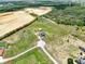 Aerial view of home, fields and construction site at 11115 Romance Ct, Winter Garden, FL 34787