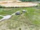 Aerial view of estate featuring home, pool, barn, long driveway and fenced pasture at 11115 Romance Ct, Winter Garden, FL 34787