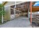 Spacious horse barn with stalls, providing a functional and safe environment for livestock at 11115 Romance Ct, Winter Garden, FL 34787