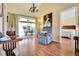 Bright and airy living room featuring hardwood floors and a view of the outdoors at 11115 Romance Ct, Winter Garden, FL 34787