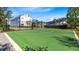 Outdoor basketball court surrounded by trees, offering residents a great recreational space at 13701 Chauvin Ave, Orlando, FL 32827