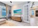 Comfortable living room featuring a white brick accent wall, large windows, and stylish decor at 13701 Chauvin Ave, Orlando, FL 32827