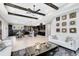 Open-concept living area with views of the kitchen, dining, and living rooms at 13701 Chauvin Ave, Orlando, FL 32827