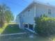 Charming home featuring a raised foundation and porch overlooking the yard at 14330 Ellerbee St, Winter Garden, FL 34787
