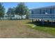 A charming home with a raised porch with a view of the lake at 14330 Ellerbee St, Winter Garden, FL 34787
