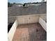 Backyard area with a brick-paved patio, enclosed by a white fence, offering a private outdoor space at 14531 Pleach St, Winter Garden, FL 34787